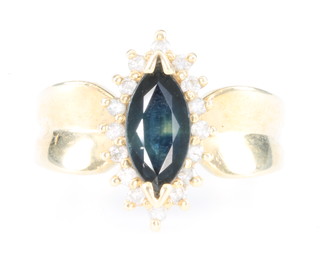 A 14ct yellow gold sapphire and diamond marquise ring, size M 