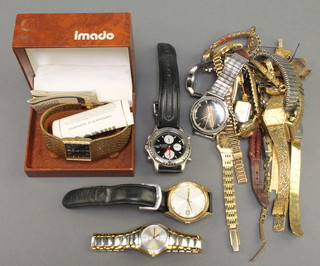 A gentleman's 1960s Sealion 24 jewel daishock Seiko wristwatch, a Seiko gilt calendar wristwatch, an Edox lady's wristwatch, an Imado wristwatch boxed and other watches 