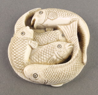 A Japanese carved ivory Netsuke in the form of 5 entwined fish, signed 2 1/4" 