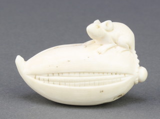A Japanese carved ivory Netsuke in the form of a mouse sitting on a cob 1 3/4" 