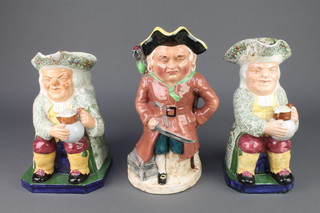 A musical character jug in the form of a pirate 11", 2 Copeland Spode seated Toby jugs 10" 