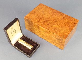 A lady's gold plated Dunhill cigarette lighter with bark finish decoration, boxed, a Dunhill walnut box 