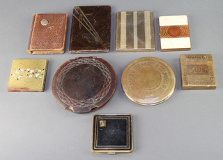 A collection of Art Deco and later cigarette cases and compacts 