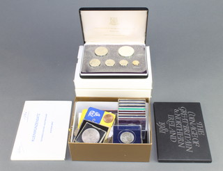 Six cased coin sets and minor commemorative crowns