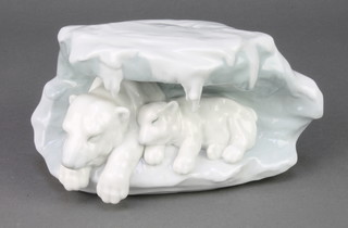A Lladro group of a polar bear and cub in a rocky crevice 8062 7" 