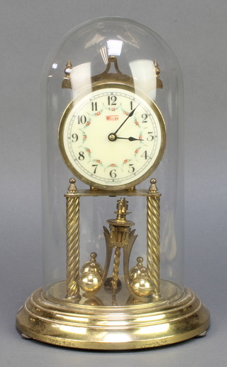 Welby, a 400 day clock with enamelled dial and Arabic numerals complete with glass dome 