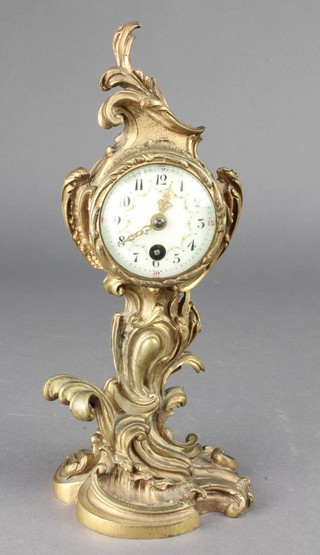 A 19th Century French timepiece with enamelled dial and Arabic numerals contained in a gilt ormolu case 