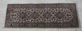 A white and blue ground Persian Kashan runner 112" x 39" 
