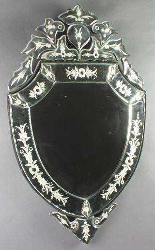 A Venetian style etched glass shield shaped mirror 31"h x 19"w 