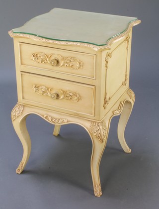 A French style white painted bedside chest of serpentine outline, fitted 2 drawers and raised on cabriole supports 26 1/2" x 17" x 16" 
