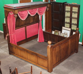 A panelled oak half tester bed frame 79"h x 74"w x 85"l 