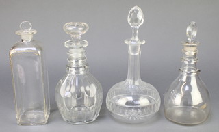 A 19th Century mallet decanter and stopper with 4 ring neck and flattened stopper 10" and 3 others