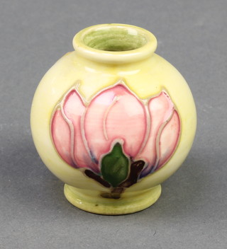 A Moorcroft yellow ground magnolia baluster vase 1 3/4"