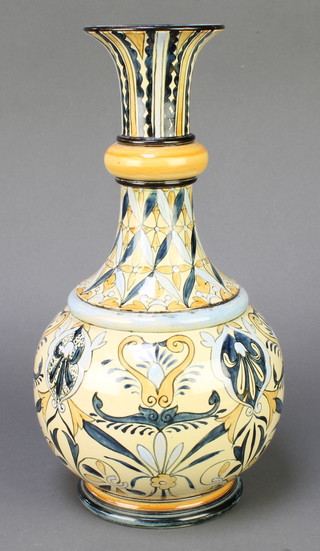 A Doulton Lambeth bottle vase with floral decoration 13"