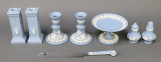 A pair of Wedgwood blue Jasperware square candlesticks decorated with classical figures 6", 1 other pair, salt and pepper, tazza and bread knife 