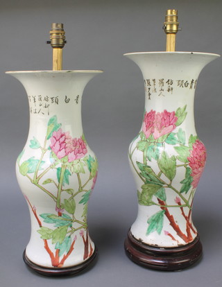 A pair of modern Chinese famille rose Ghu shaped vases decorated with birds amongst flowers converted to electricity 