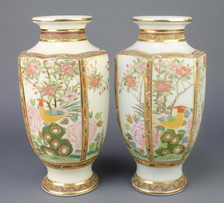 A pair of mid 20th Century Japanese Satsuma hexagonal vases decorated with panels of flowers 12" 