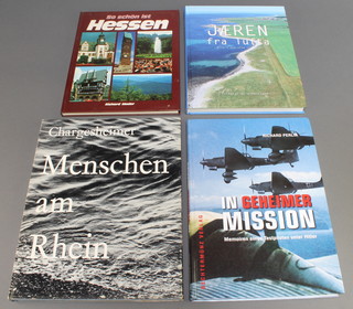 From the estate of Captain Eric M Brown, a collection of books "Chargesheimer Menschen Am Rheim", "Jaeren Fra Lufta - Birdseye View of Jaeren", Richard Mader  "Soschon Ist Hessen", Richard Perlia "In Geheimer Mission",  Alan Bond and Mark Hempsell 1 volume "A Sumerian Observation of the Kofels Impact Event" signed to Eric Brown with best wishes Alan Bond and Mark Hempsell, 7 other Continental signed volumes  and  10 various German and Russian signed books 

