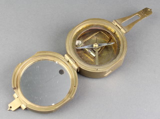 A reproduction brass prismatic compass 
