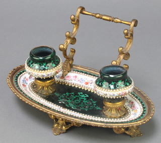 A 19th Century French enamelled boat shaped 2 bottle standish with floral decoration and gilt mounts and pen rest 6" x 9" x 5" 