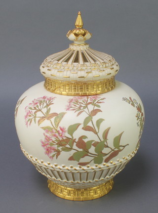 A Royal Worcester blush porcelain vase and cover with basketwork decoration and reticulated lid  the body with spring flowers no.1286 12" 