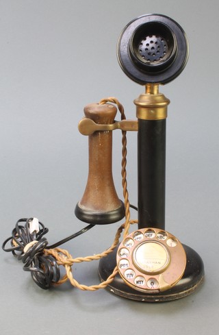 A candlestick telephone 