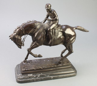 After Mene, a bronze figure of a racehorse with jockey up, raised on an oval stepped base 13"h x 12"w x 4"d 
