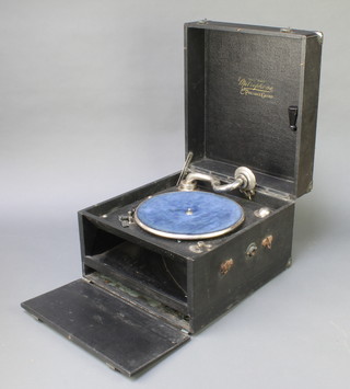 The Metaphone portable gramophone in a fibre case (handle missing) and a collection of 78 rpm records 