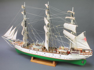 A wooden model of The Denmark a Danish 3 masted merchant ship, 23"h x 39"w x 5"d 