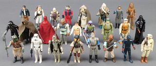 25 original Star Wars figures with guns and accessories consisting of :-Rebel Soldier (Hoth Battle Gear with gun),
Boba Fett (with gun),
Bib Fortuna (with staff, cloth cape and plastic chest plate),
Chewbacca (with gun), 
ROJ Luke Skywalker (with cloth cape, lightsaber and blaster),
Darth Vader (vinyl cape and lightsaber - non telescopic), 
Emperors Royal Guard (with cloth cape and weapon), 
Squid Head  (with cloth cape, plastic belt and under robe), 
ESB C-3PO (removable limbs and plastic back pack), 
ESB Leia (Hoth Outfit with gun),
ROJ Leia (Boushh Disguise with helmet and gun), 
ESB Han Solo (Bespin Outfit with gun),
Imperial Tie Fighter Pilot (with gun),
Nikto (with gun), 
Klatu (with Pikestaff), 
Weequay (with Pikestaff), 
Nien Nunb (with gun), 
Rebel Commando (with gun), 
General Madine (with staff) 
Storm Trooper (with gun),
Dengar (with gun), 
Bedpan Security Guard (with gun), 
Rebel Commander,
Luke Skywalker (Hoth Battle Gear, with gun) and
AT-AT Commander (with gun)