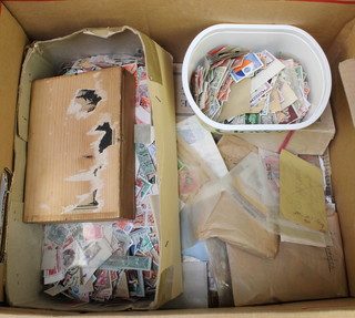 A box of loose used World stamps