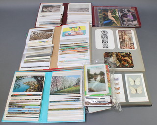2 albums of saucy coloured postcards, 8 Edwardian coloured photographs, 3 postcard albums and various loose postcards 