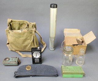 A tail section from a German 4 kg incendiary bomb, an RAF side cap, a civilian gas mask, a military gas mask case, 2 torches, etc 