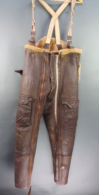 A pair of leather and sheepskin flying trousers 