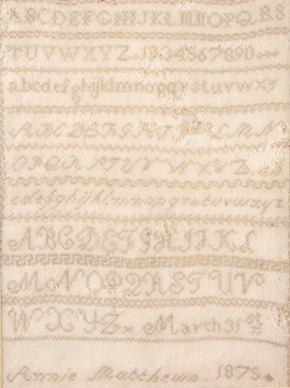 A Victorian stitchwork sampler with alphabet and numerals by Pennie Matthews, dated 1875 8"x6"