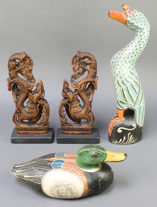 A reproduction painted wooden decoy duck 13", a wooden figure of a standing goose 19" and 2 "Burmese" mahogany panels decorated dragons 14" 