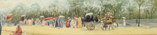 An Edwardian watercolour unsigned, a townscape with a procession of figures and camels walking beside a park 3 1/4" x 14 1/4" 