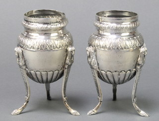 A pair of Continental silver vases with demi fluted and leaf decoration, raised on monopods with hoof feet 278 grams, 4 1/2" 