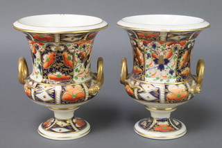 A pair of 19th Century Crown Derby Japan pattern urn vases with serpent handles  7" 