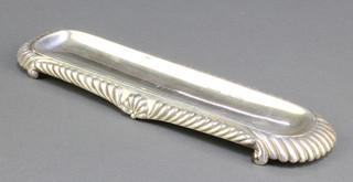 A Victorian rounded rectangular repousse silver pen tray Birmingham 1890