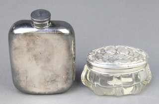 An Edwardian silver mounted toilet jar with Reynolds Angels lid Birmingham 1903 3" and a silver plated hip flask 