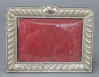 A Victorian repousse silver rectangular photograph frame Chester 1897 7 1/2"  