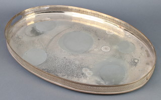 An oval silver plated galleried 2 handled tray 24" 