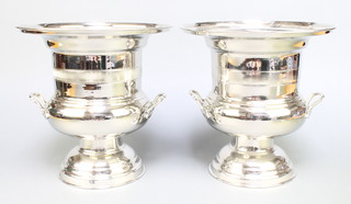 A pair of plated urn shaped champagne coolers 10" 