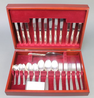 A 43 piece canteen of silver plated Community cutlery for 6 contained in a mahogany finished case