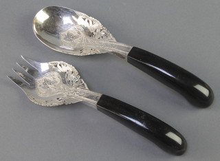 A pair of Thai horn handled silver mounted servers 