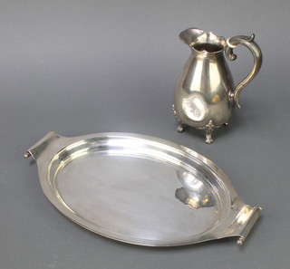 A stylish Art Deco oval silver plated tray 15", ditto water jug 