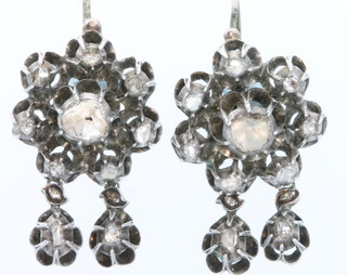 A pair of Indian silver diamond set earrings 
