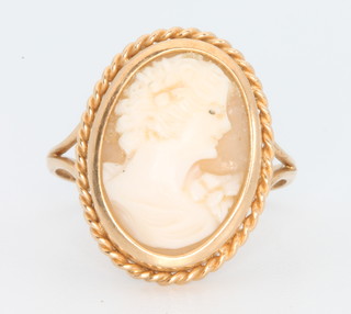 An 18ct yellow gold cameo ring, a pair of 9ct gold pearl ear studs