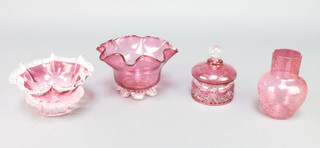 A cranberry glass bowl 4", a ditto with clear glass decoration 3", a baluster vase 5" and a lidded box 4" 